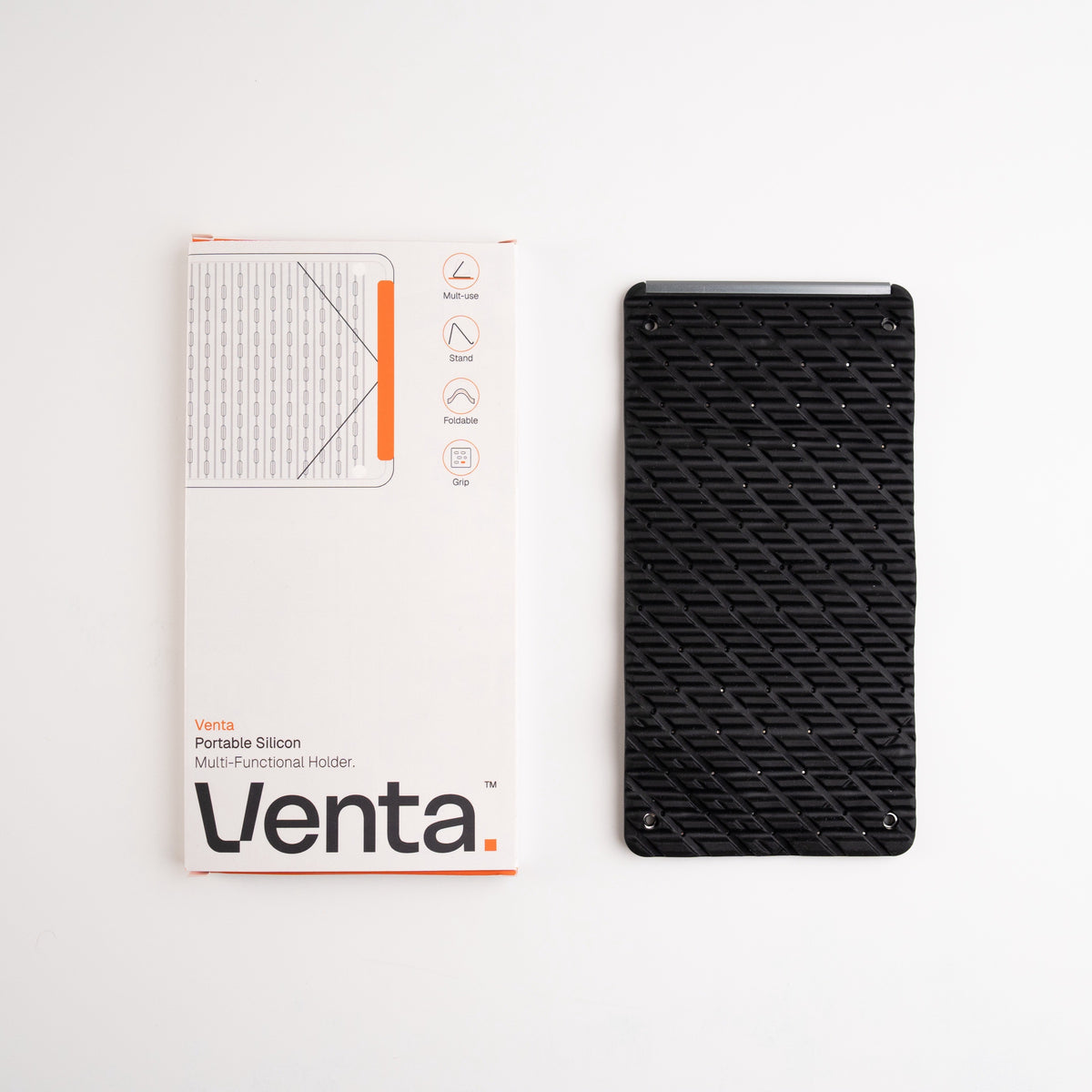 Venta Portable Silicone Holder in Black beside its box